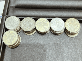 硬貨／1000円銀貨弊／など