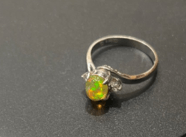 Pt900 / ファイアオパール / 0.80ct / メレダイヤ / 0.06ctなど2点