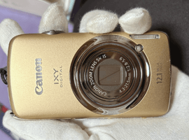 Canon：IXY DIGITAL 930 IS／Canon：交換レンズ付きボディなど3点